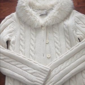 White fluffy buttoned down sweater.